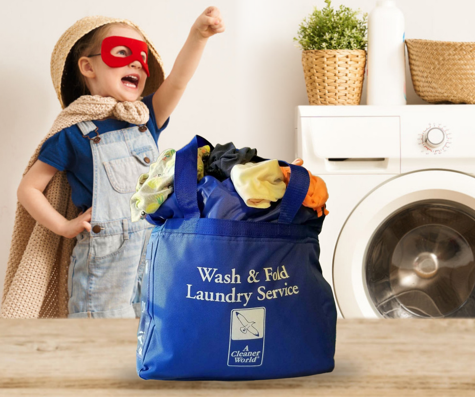 Superhero kid standing behind Wash and Fold Laundry Bag